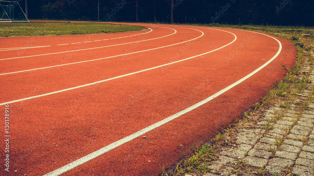 Fototapeta premium Red running track in stadium.