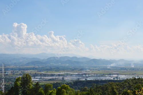 paddy field and mountain background in Thailand countryside