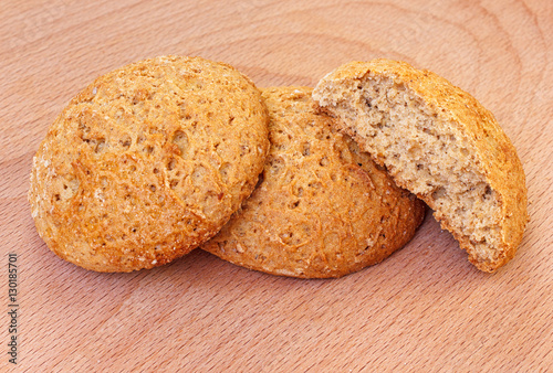 Natural oat cookies portion on wooden background