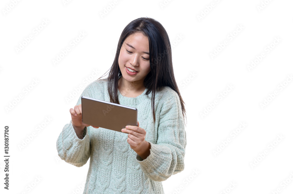Young Chinese woman using a tablet pc Young Chinese woman using a tablet pc