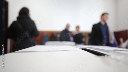 A person casts her ballot during voting for parliamentary elections at a polling station in Bucharest, Romania.