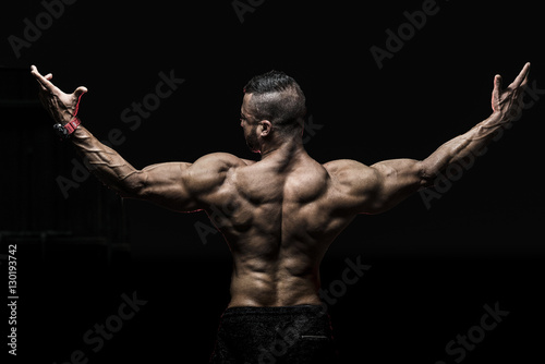 Man showing muscular Back