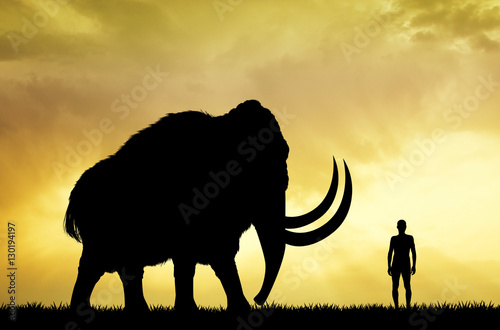 mammoth and man at sunset