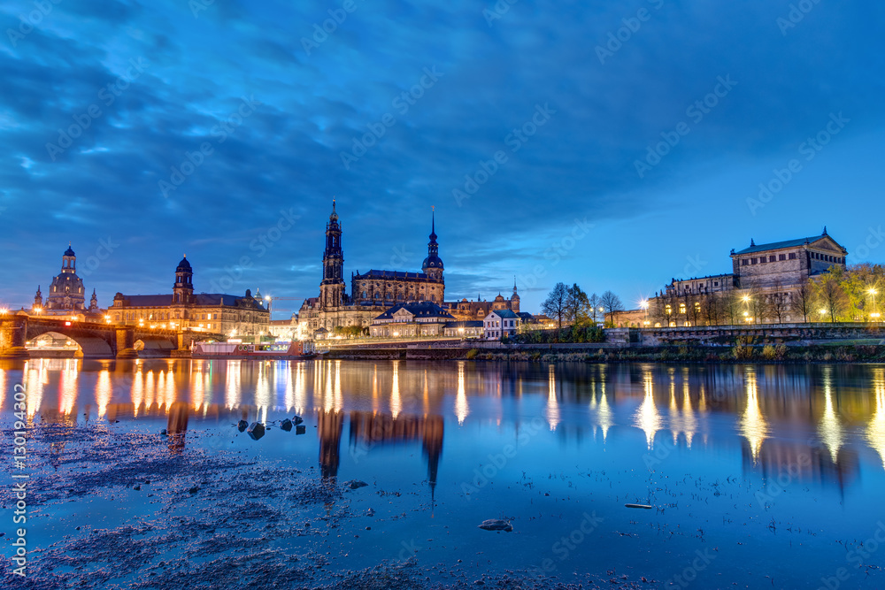 The famous skyline of Dresden with the river Elbe at night