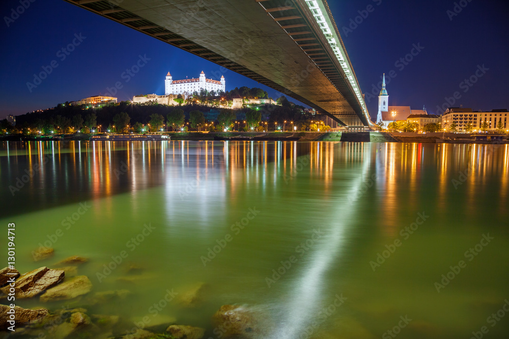 Bratislava, Slovakia. Cityscape image of Bratislava riverside at night.