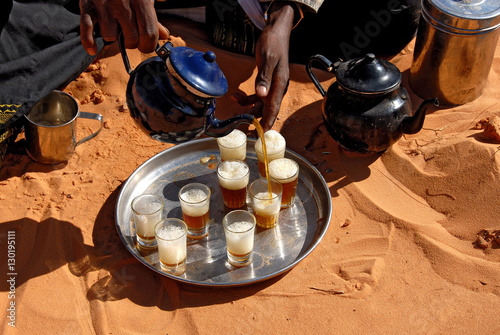 Tuareg pouring tea, Sebha, Ubari, Libya photo