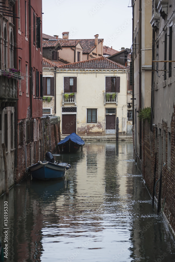 Venetian canal under the rain