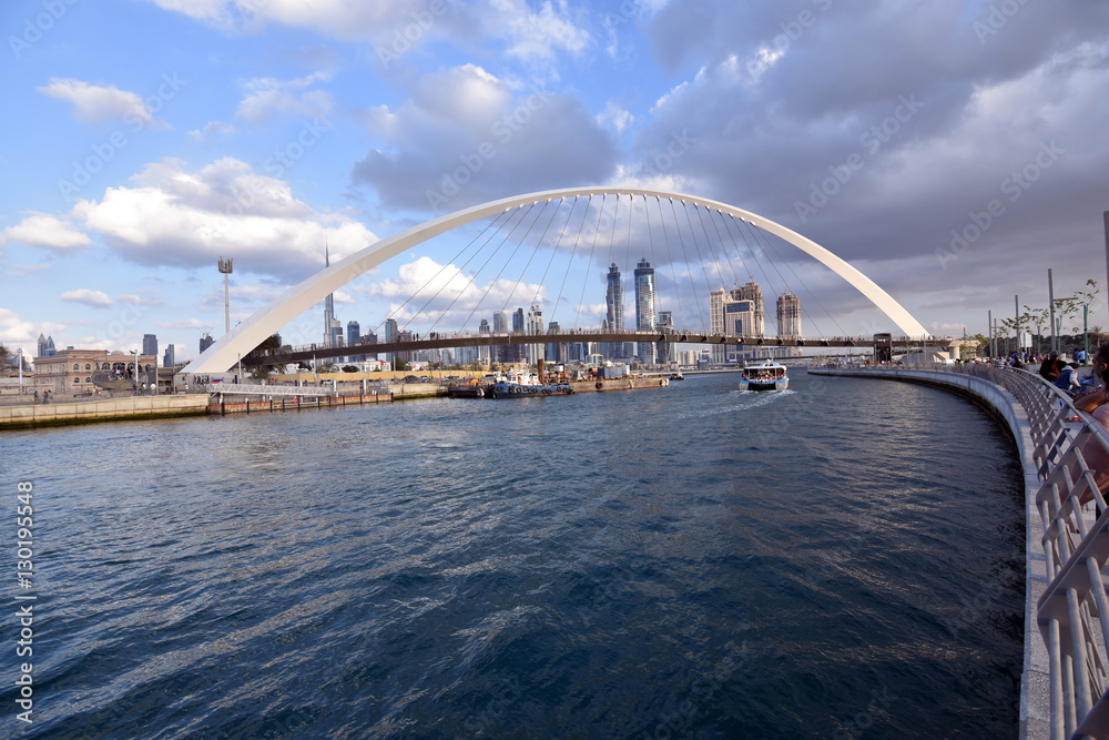 Fototapeta premium Dubai Skyline at night from new Dubai Canal, U.A.E