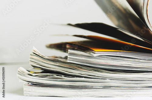 stack of magazines to turn pages