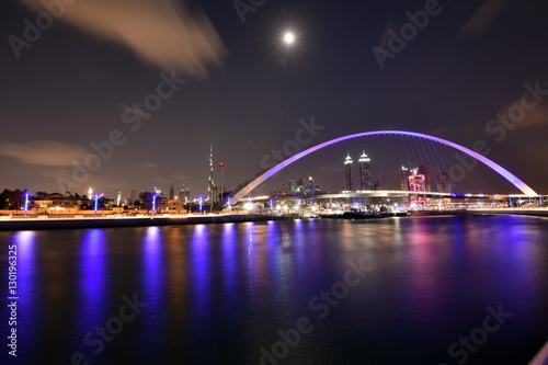 Dubai Skyline at night from new Dubai Canal, U.A.E