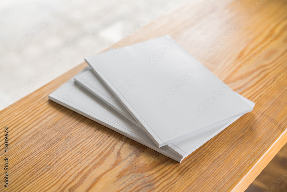 Blank catalog, magazines,book mock up on wood background . Blank catalog, magazines,book mock up on wood background .