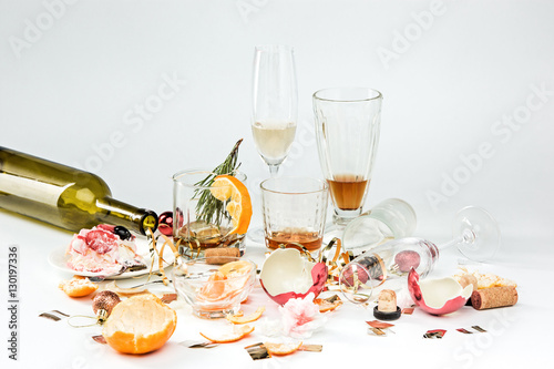 Canvas Print The morning after christmas day, table with alcohol and leftovers