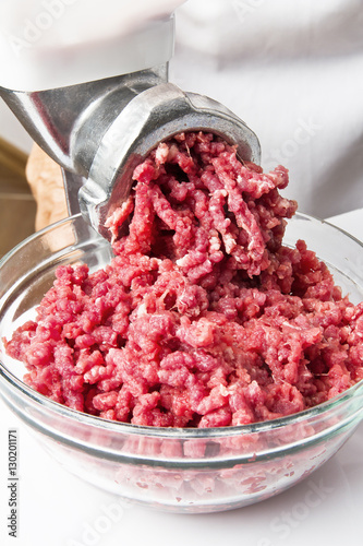 Cooking ground beef in a meat grinder