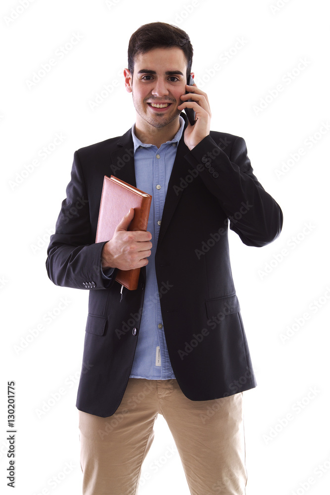 Young man with mobile phone and book isolated on white Young man with mobile phone and book isolated on white