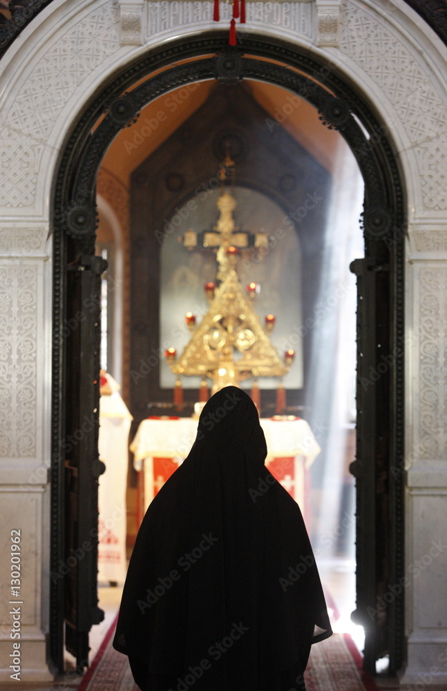 Nun in Mary Magdalene Russian Orthodox church on Mount of Olives, Jerusalem, Israel Nun in Mary Magdalene Russian Orthodox church on Mount of Olives, Jerusalem, Israel