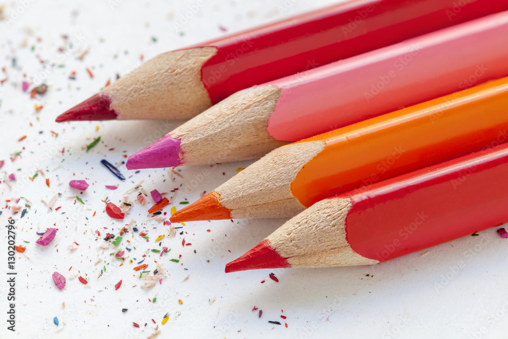 Sharpened colorful pencils and wood shavings Sharpened colorful pencils and wood shavings