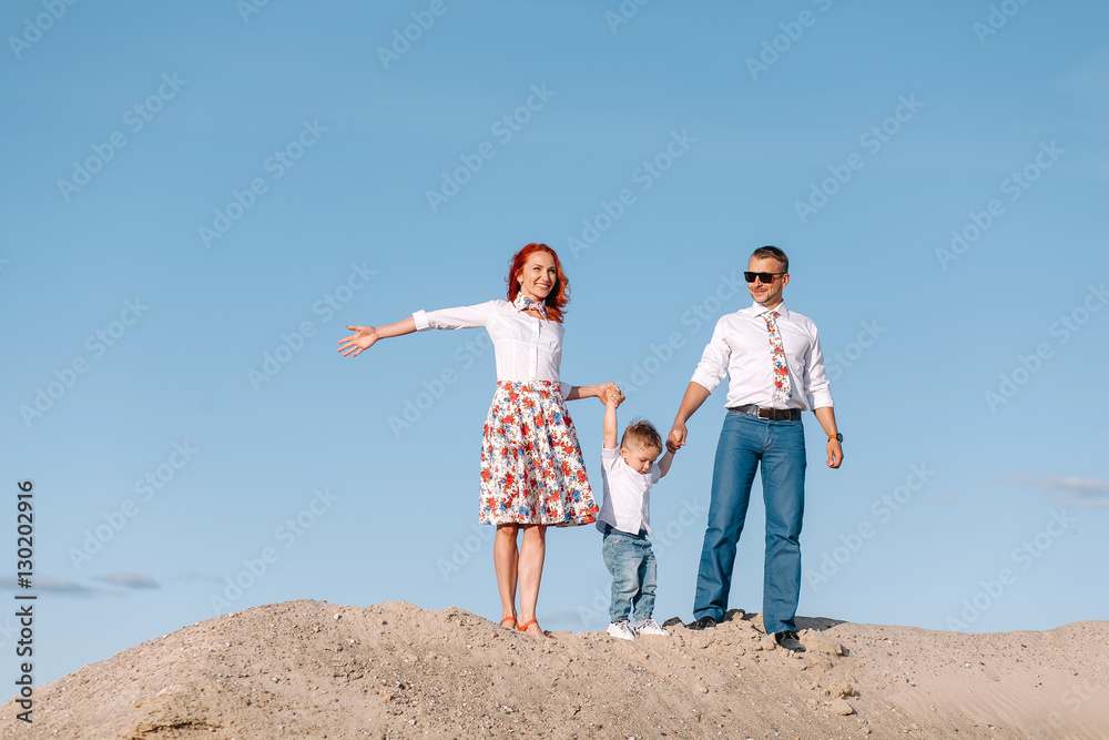 happy family standing against the sky happy family standing against the sky