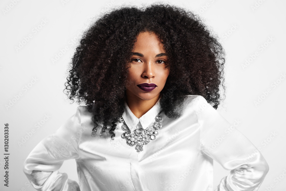 serious black woman with violet lips. serious black woman with violet lips.
