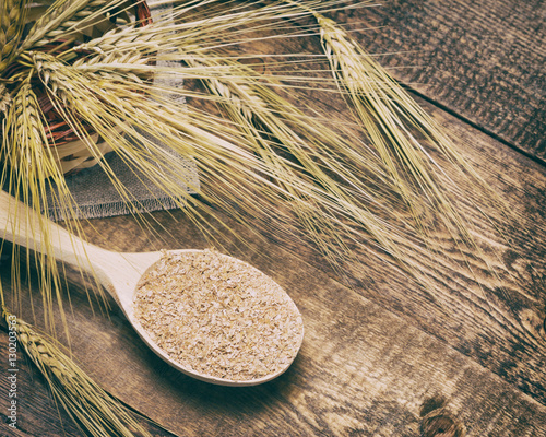 Wooden spoon with wheat bran