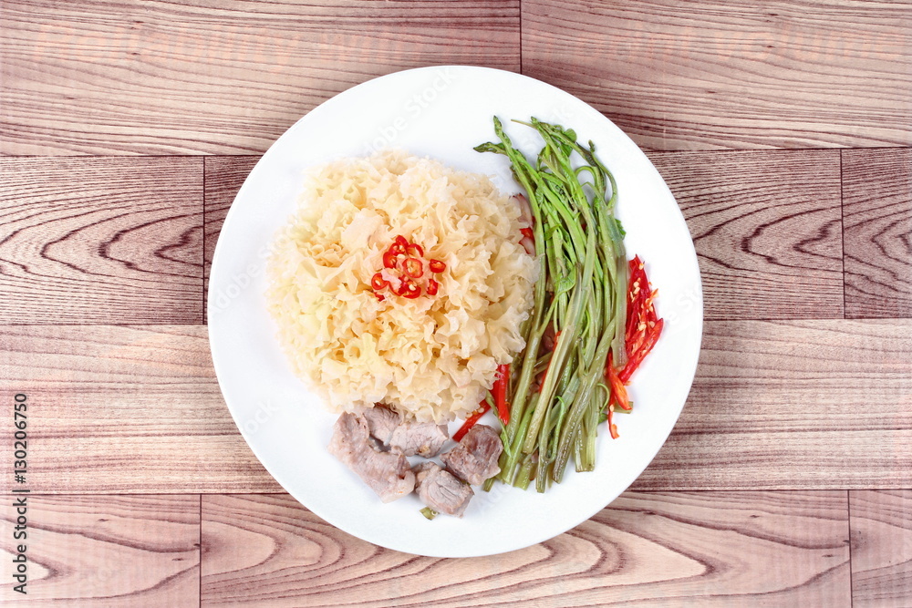 Thai spicy fried snow fungus mushroom with morning glory. Thai spicy fried snow fungus mushroom with morning glory.