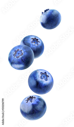 Obraz na płótnie Isolated blueberries flying in the air