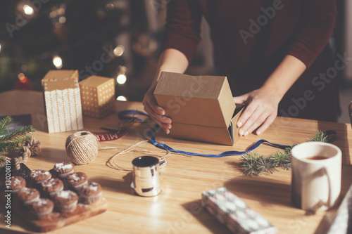 Woman Wrapping Christmas Present