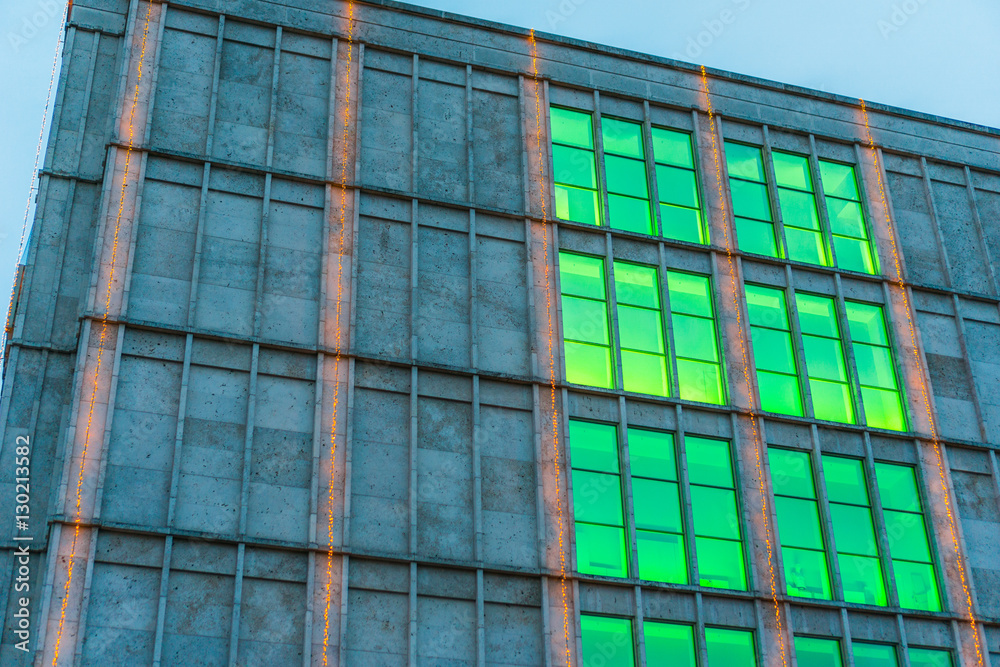 Fototapeta premium industrial building with big green colored windows