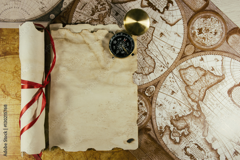 Old parchment paper and golden compass on world map Stock Photo | Adobe ...