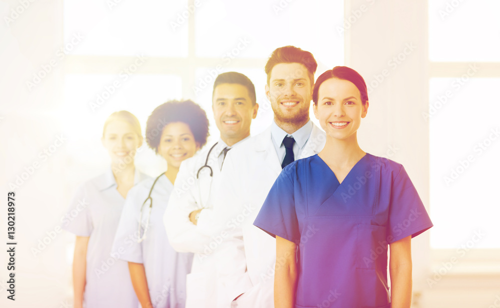 group of happy doctors at hospital group of happy doctors at hospital