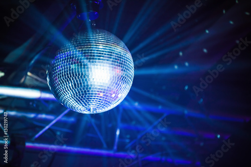 Disco ball with rays, party background