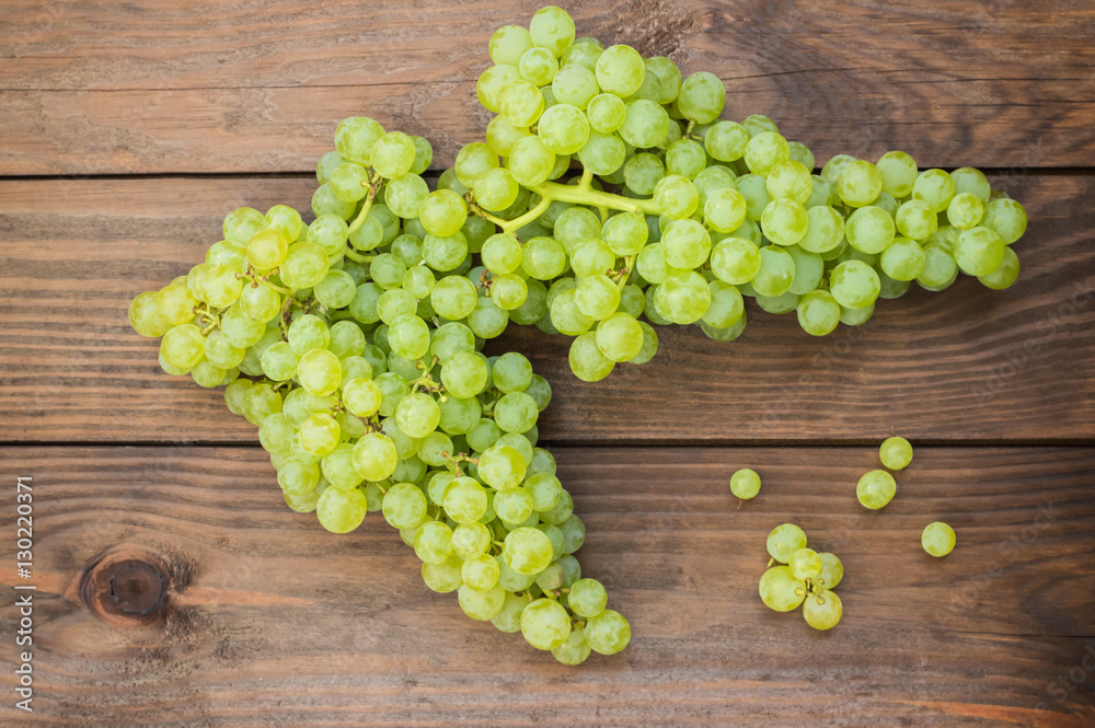 Sultan Grapes on a wooden background. Close-up. Selective focus Sultan Grapes on a wooden background. Close-up. Selective focus