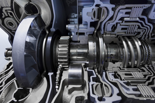 Gearbox cross-section, engine industry, sprockets, cogwheels and bearings of automotive transmission for oversize trucks, SUV, cargo, commercial and construction vehicles, selective focus 