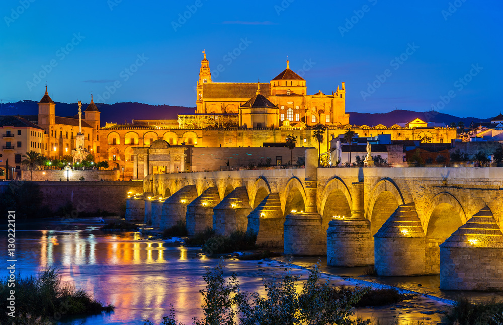 Roman Bridge across the Guadalquivir river and Mosque-Cathedral in Cordoba, Spain