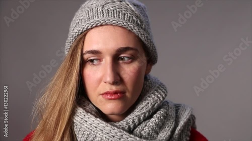 one attractive female teenager waiting alone with impatience in winter