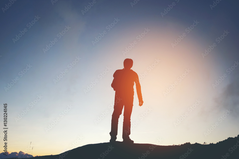  silhouette of Traveler man at sunset