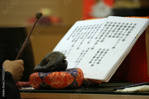 Buddhist sacred texts and a wooden fish (percussion instrument), Fo Guang Shan Temple, Geneva photo