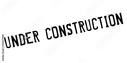 Under construction rubber stamp. Grunge design with dust scratches. Effects can be easily removed for a clean, crisp look. Color is easily changed.