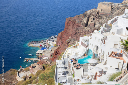 SANTORINI, GREECE - OCTOBER 5, 2015: The luxury resorts in Oia and the Amoudi harbor.
