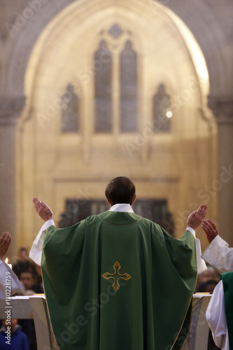 Eucharist, priest in Catholic Mass, Notre-Dame du Perpetuel Secours Basilica, Paris, France