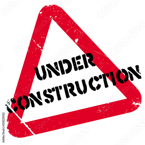 Under construction rubber stamp. Grunge design with dust scratches. Effects can be easily removed for a clean, crisp look. Color is easily changed.
