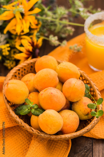 Ripe apricots on a wooden table. Selective focus. Close-up