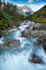 Papier peint photo Rivière Rivière glaciaire bleu laiteux norvégienne  © Dmitry Naumov