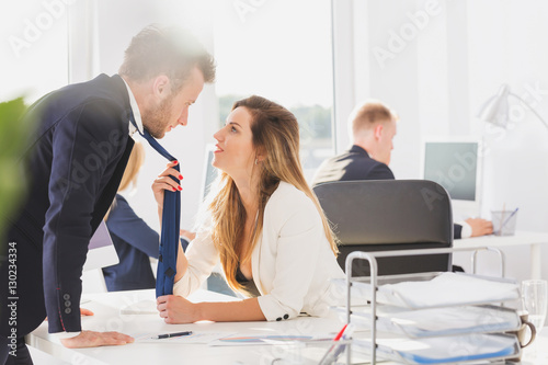 Fotografie Passionate couple in the office