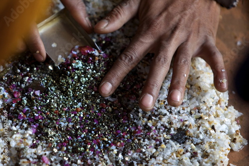 After bashing the sand, the ruby stones concentrate naturally in the middle of the container, Mogok photo