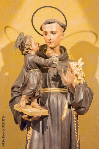 ROME, ITALY - MARCH 12, 2016: The carved statue of St. Anthony of Padua in church Chiesa di Nostra Signora del Sacro Cuore by unknown artist.