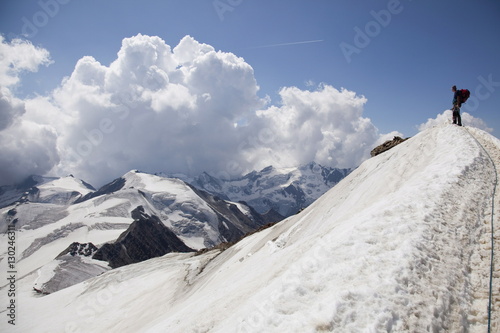 Reaching the summit of Mount Cevedale, 3769 m, Ortler Alps, South Tyrol photo