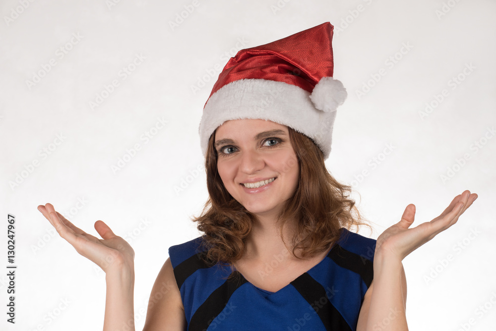 Girl in a red Christmas hat with different funny emotion on his Girl in a red Christmas hat with different funny emotion on his