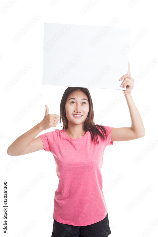 Young Asian woman show thumbs up with white blank sign. Young Asian woman show thumbs up with white blank sign.