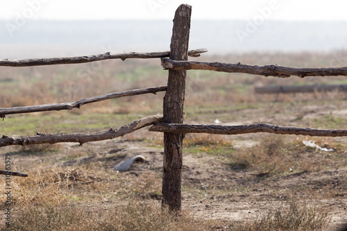 Obraz na płótnie wooden stick on the fence
