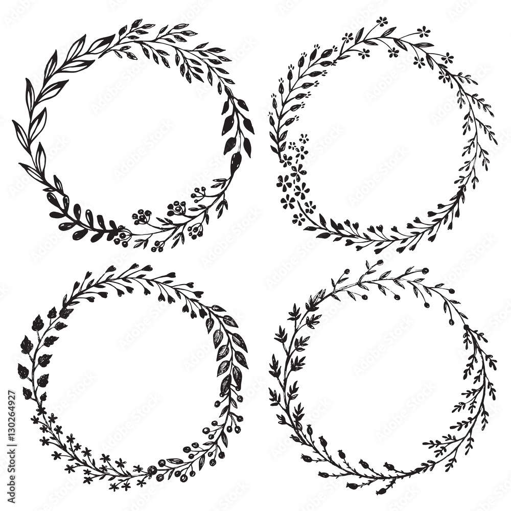 Set of hand drawn vector floral wreaths with leaves, flowers, berries.